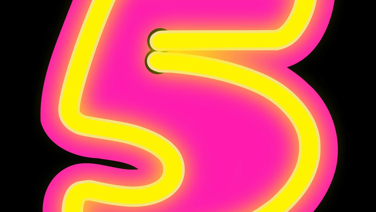 closeup of slices of Pressure Cooker Corned Beef on a platter with potatoes, carrots, and Brussels sprouts