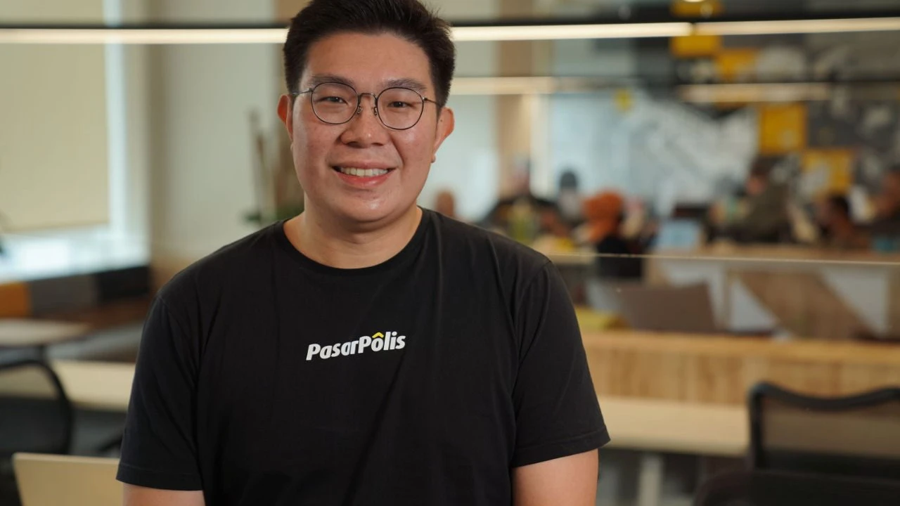 Close up on a plate of mashed potatoes, topped with baked pork chops with cream of mushroom soup, and a side of green beans.