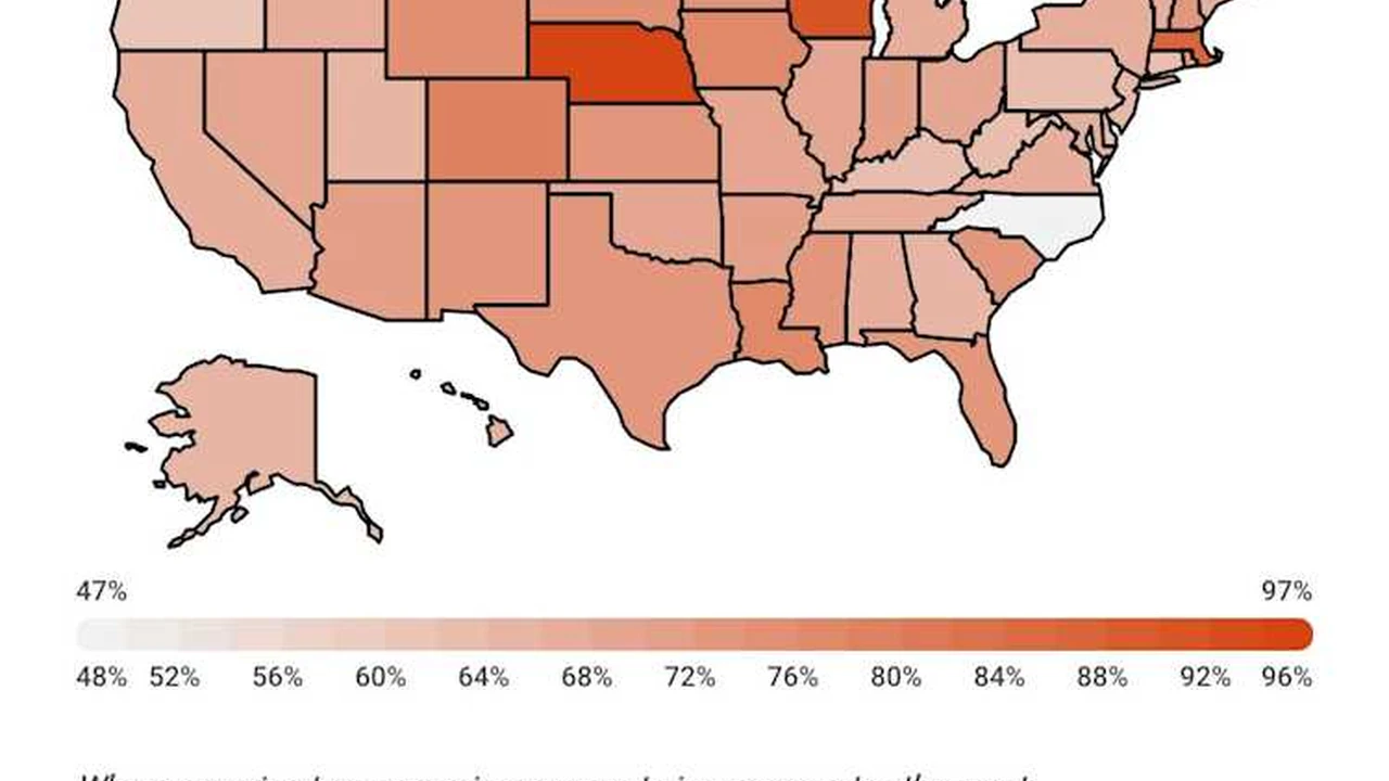Close up on a plate of mashed potatoes, topped with baked pork chops with cream of mushroom soup, and a side of green beans.