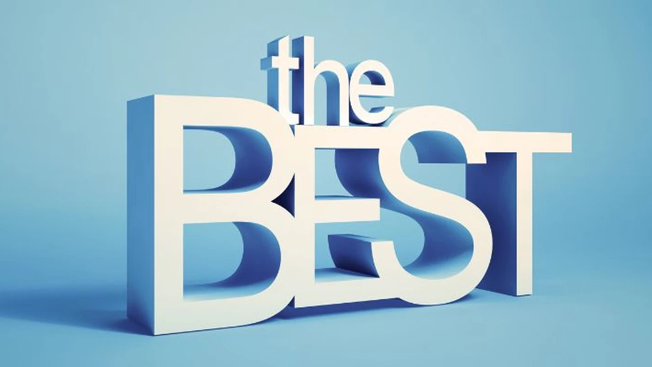 Close up on a plate of mashed potatoes, topped with baked pork chops with cream of mushroom soup, and a side of green beans.