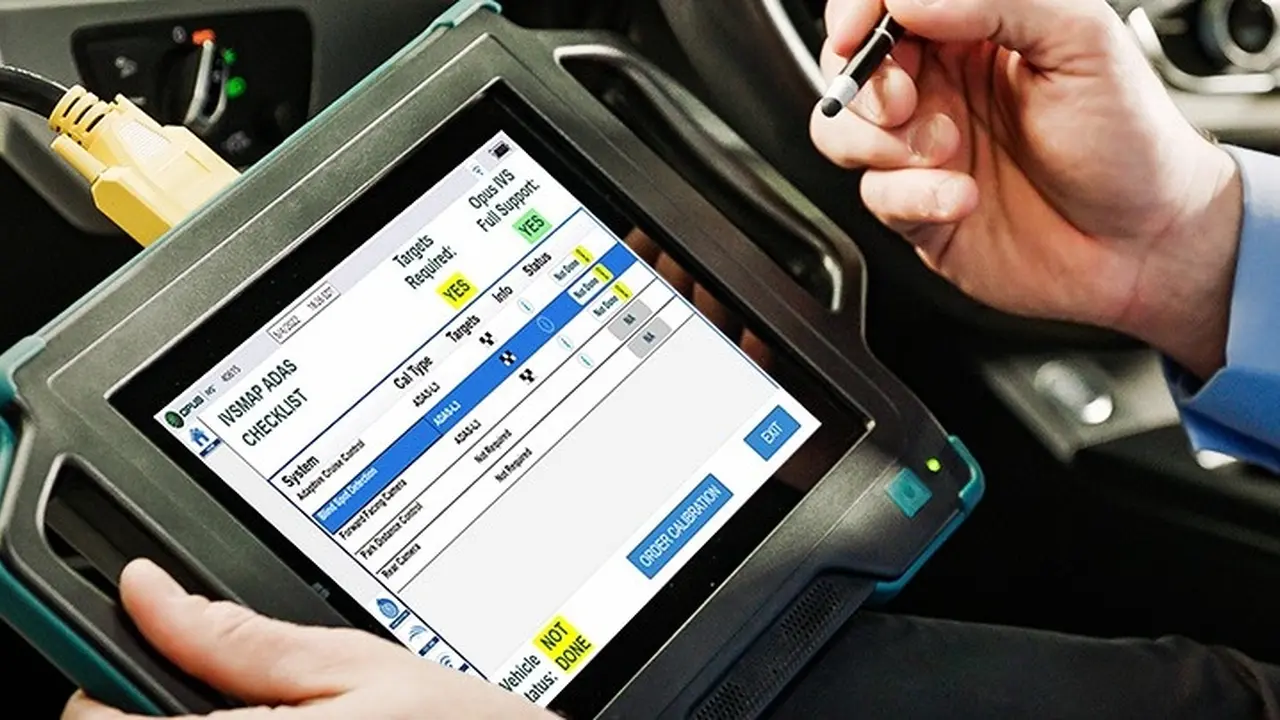 overhead view of corned beef sliced and on a platter with cabbage, potatoes, and carrots